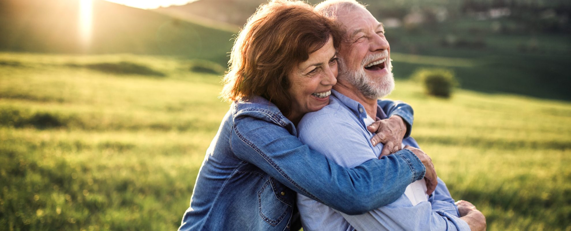 Retired senior couple outdoors in nature